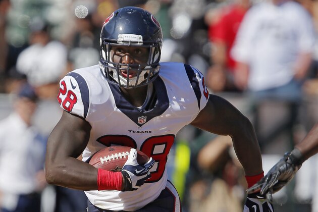 OAKLAND, CA - SEPTEMBER 14:  Running back Alfred Blue #28 of the Houston Texans sprints against the Oakland Raiders in the fourth quarter on September 14, 2014 at O.co Coliseum in Oakland, California.  The Texans won 30-14.  (Photo by Brian Bahr/Getty Images)