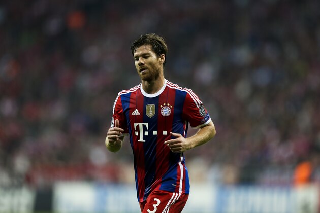 Bayern's Xabi Alonso reacts during the Champions League Group E soccer match between FC Bayern Munich and Manchester City at Allianz Arena in Munich, southern Germany, Wednesday Sept. 17, 2014. (AP Photo/Matthias Schrader)