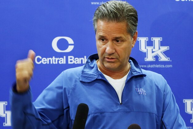 Kentucky head coach John Calipari speaks to the media before the team's NCAA college basketball practice Wednesday, Aug. 6, 2014, in Lexington, Ky.  He said that twin guards Andrew and Aaron Harrison have lost weight, so they're more athletic and playing faster. (AP Photo/James Crisp)