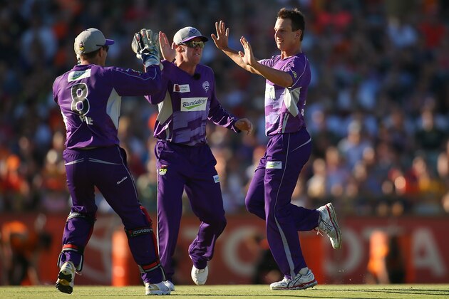 PERTH, AUSTRALIA - FEBRUARY 07: Evan Gulbis of the Hurricanes celebrates the wicket of Craig Simmons of the Scorchers during the Big Bash League Final match between the Perth Scorchers and the Hobart Hurricanes at the WACA on February 7, 2014 in Perth, Australia.  (Photo by Paul Kane/Getty Images)