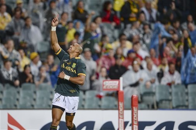 South Africa's Cornal Hendricks celebrates a first half try against Australia during their Rugby Championship test match in Perth, Australia, Saturday, Sept. 6, 2014. (AP Photo)