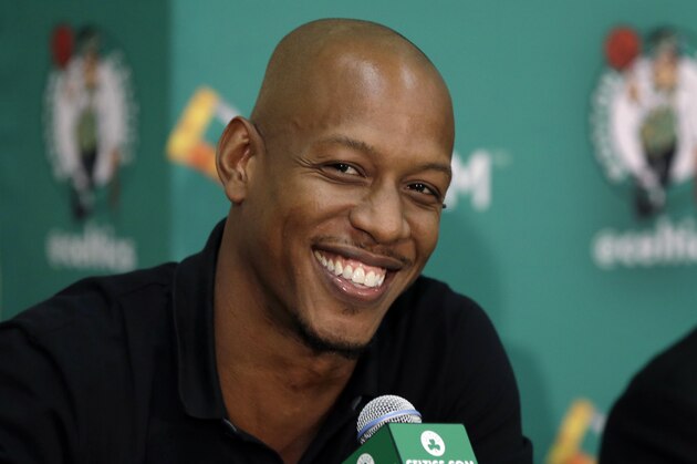 Newly acquired Boston Celtics player Keith Bogans smiles in Waltham, Mass., Monday, July 15, 2013, during an NBA basketball news conference to introduce players the team acquired from the Brooklyn Nets in exchange for Kevin Garnett and Paul Pierce. (AP Photo/Elise Amendola)