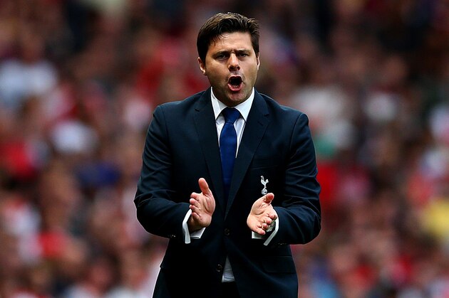 LONDON, ENGLAND - SEPTEMBER 27:  Manager Mauricio Pochettino of Spurs reacts during the Barclays Premier League match between Arsenal and Tottenham Hotspur at Emirates Stadium on September 27, 2014 in London, England.  (Photo by Paul Gilham/Getty Images)