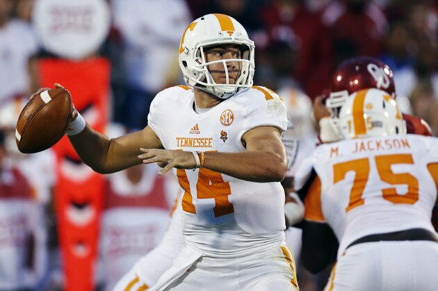 Tennessee quarterback Justin Worley (14) throws against Oklahoma in the first quarter of an NCAA college football game in Norman, Okla., Saturday, Sept. 13, 2014. (AP Photo/Sue Ogrocki)