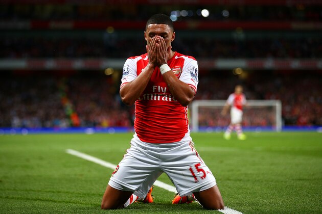 LONDON, ENGLAND - SEPTEMBER 27:  Alex Oxlade-Chamberlain of Arsenal reacts after a missed opportunity during the Barclays Premier League match between Arsenal and Tottenham Hotspur at Emirates Stadium on September 27, 2014 in London, England.  (Photo by Paul Gilham/Getty Images)