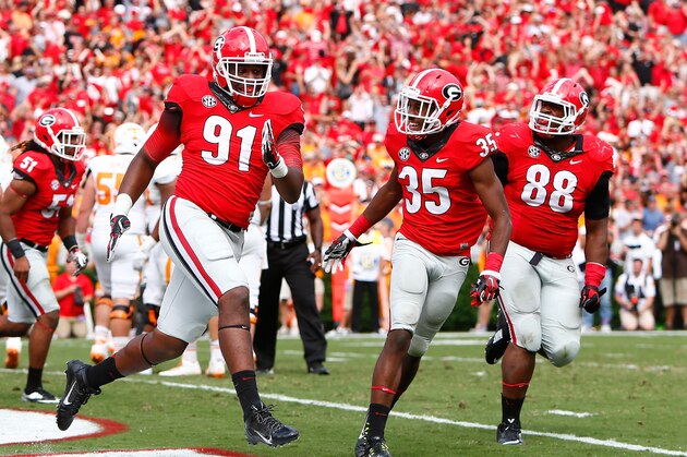 ATHENS, GA - SEPTEMBER 27:  Josh Dawson #91 of the Georgia Bulldogs celebrates recovering a fumble for a touchdown against the Tennessee Volunteers at Sanford Stadium on September 27, 2014 in Athens, Georgia.  (Photo by Kevin C. Cox/Getty Images)
