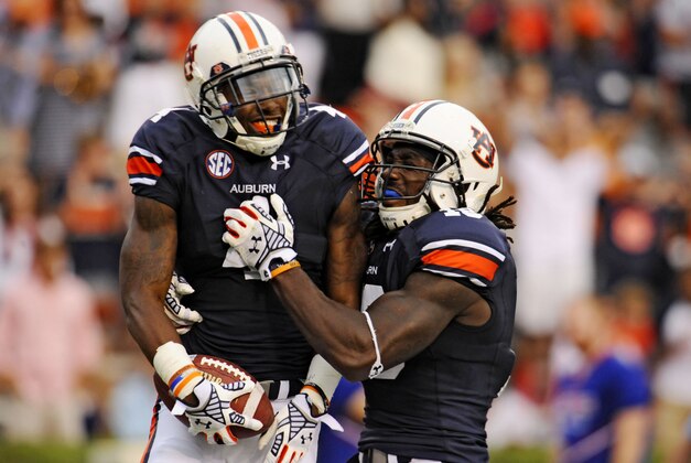 Sep 27, 2014; Auburn, AL, USA; Auburn Tigers wide receiver Quan Bray (4) and wide receiver Sammie Coates (18) react to a touchdown during the second half against the Louisiana Tech Bulldogs at Jordan Hare Stadium. Auburn won 45-17. Mandatory Credit: Shanna Lockwood-USA TODAY Sports