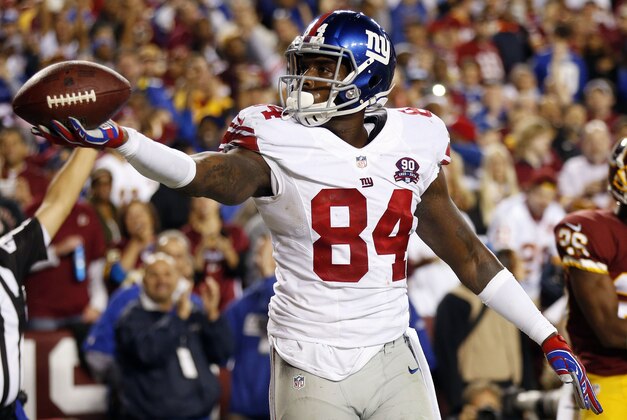 Sep 25, 2014; Landover, MD, USA; New York Giants tight end Larry Donnell (84) celebrates after scoring a touchdown against the Washington Redskins in the second quarter at FedEx Field. Mandatory Credit: Geoff Burke-USA TODAY Sports