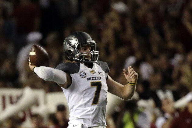Missouri quarterback Maty Mauk (7) passes the ball during the first half of an NCAA college football game against South Carolina on, Saturday, Sept. 27, 2014, in Columbia, S.C.. (AP Photo/Stephen B. Morton)