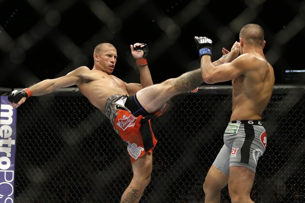 Donald Cerrone kicks Eddie Alvarez in their lightweight mixed martial arts bout at UFC 178 on Saturday, Sept. 27, 2014, in Las Vegas. (AP Photo/John Locher) Donald Cerrone kicks Eddie Alvarez in their lightweight mixed martial arts bout at UFC 178 on Saturday, Sept. 27, 2014, in Las Vegas. (AP Photo/John Locher)