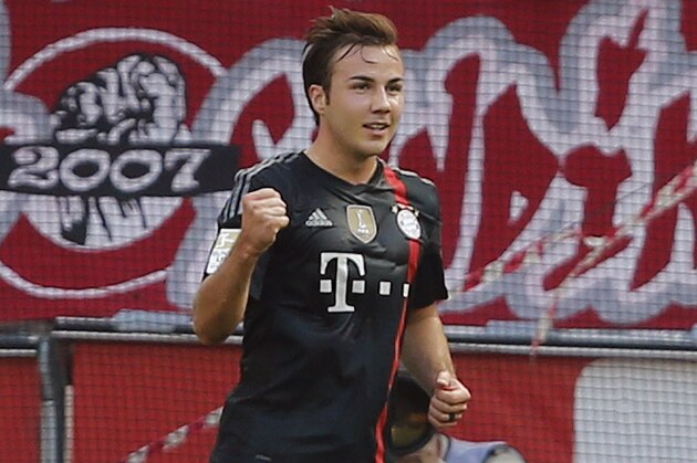 Bayern's Mario Goetze celebrates after scoring during the German first division Bundesliga soccer match between FC Cologne and Bayern Munich in Cologne, Germany, Saturday, Sept. 27, 2014. (AP Photo/Frank Augstein)