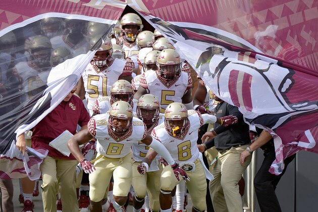 RALEIGH, NC - SEPTEMBER 27: Florida State Seminoles players take the field for their game against the North Carolina State Wolfpack at Carter-Finley Stadium on September 27, 2014 in Raleigh, North Carolina. (Photo by Grant Halverson/Getty Images)