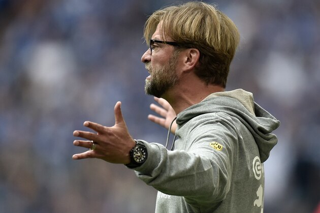 Dortmund's head coach Juergen Klopp reacts during the German Bundesliga soccer match between FC Schalke 04 and Borussia Dortmund in Gelsenkirchen, Germany, Saturday, Sept. 27, 2014. Schalke won the derby with 2-1. (AP Photo/Martin Meissner)