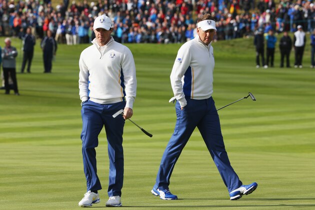 AUCHTERARDER, SCOTLAND - SEPTEMBER 27:  Rory McIlroy of Europe and Ian Poulter of Europe look on during the Morning Fourballs of the 2014 Ryder Cup on the PGA Centenary course at the Gleneagles Hotel on September 27, 2014 in Auchterarder, Scotland.  (Photo by Ross Kinnaird/Getty Images)