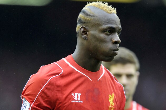 Liverpool's Mario Balotelli in action during their English Premier League soccer match against Everton at Anfield in Liverpool, England, Saturday Sept. 27, 2014. (AP Photo/Clint Hughes)