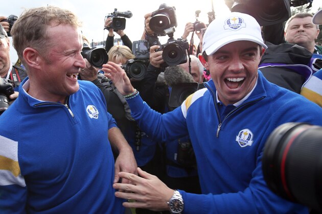 Europe’s Jamie Donaldson, left, and Rory McIlroy celebrate winning the 2014 Ryder Cup golf tournament at Gleneagles, Scotland, Sunday, Sept. 28, 2014. (AP Photo/Peter Morrison) Europe’s Jamie Donaldson, left, and Rory McIlroy celebrate winning the 2014 Ryder Cup golf tournament at Gleneagles, Scotland, Sunday, Sept. 28, 2014. (AP Photo/Peter Morrison)