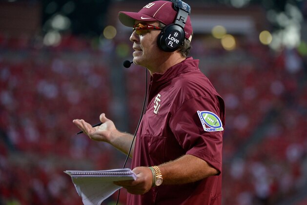 RALEIGH, NC - SEPTEMBER 27: Head coach Jimbo Fisher of the Florida State Seminoles questions a penalty during their game against the North Carolina State Wolfpack at Carter-Finley Stadium on September 27, 2014 in Raleigh, North Carolina. Florida State won 56-41. (Photo by Grant Halverson/Getty Images)