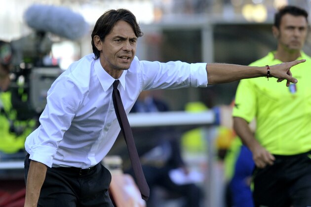 AC Milan coach Filippo Inzaghi gestures during a serie A soccer match between Cesena and AC Milan at Cesena's Manuzzi stadium, Italy, Sunday, Sept. 28, 2014. (AP Photo/Marco Vasini)