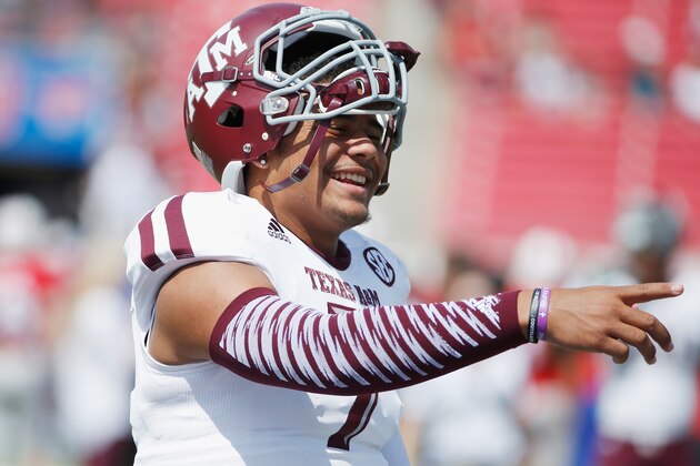 DALLAS, TX - SEPTEMBER 20:  Kenny Hill #7 of the Texas A&M Aggies waits on the field prior to the start of their game against the Southern Methodist Mustangs at the Gerald J. Ford Stadium on September 20, 2014 in Dallas, Texas.  (Photo by Scott Halleran/Getty Images)