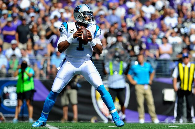 BALTIMORE, MD - SEPTEMBER 28: Quarterback Cam Newton #1 of the Carolina Panthers drops back to pass in the first half of a game against the Baltimore Ravens at M&T Bank Stadium on September 28, 2014 in Baltimore, Maryland.  (Photo by Larry French/Getty Images)