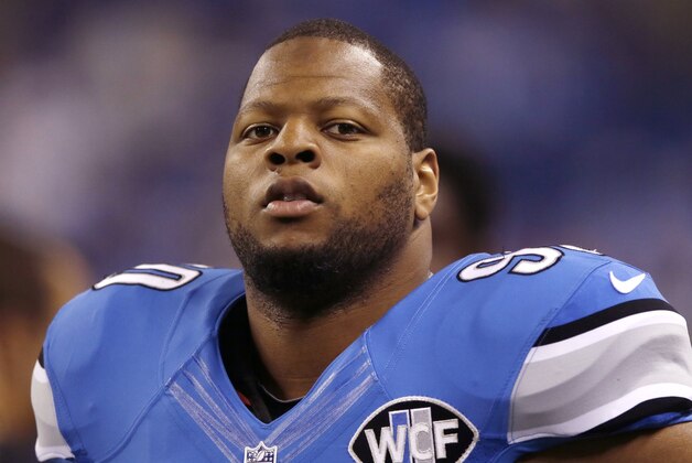 Detroit Lions defensive tackle Ndamukong Suh is seen during warm-ups before an NFL football game against the Green Bay Packers in Detroit, Sunday, Sept. 21, 2014. (AP Photo/Carlos Osorio)
