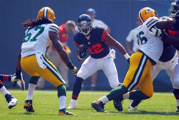Sep 28, 2014; Chicago, IL, USA; Chicago Bears running back Matt Forte (22) runs with the ball during the first quarter against the Green Bay Packer at Soldier Field. Mandatory Credit: Dennis Wierzbicki-USA TODAY Sports