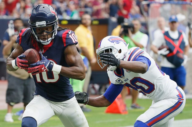 HOUSTON, TX - SEPTEMBER 28:  DeAndre Hopkins #10 of the Houston Texans scores a second quarter touchdown in front of Corey Graham #20 of the Buffalo Bills at NRG Stadium on September 28, 2014 in Houston, Texas.  (Photo by Scott Halleran/Getty Images)