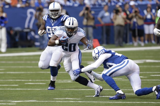 Tennessee Titans running back Bishop Sankey avoids the tackle of Indianapolis Colts free safety Darius Butler during the second half of an NFL football game in Indianapolis, Sunday, Sept. 28, 2014. (AP Photo/AJ Mast)