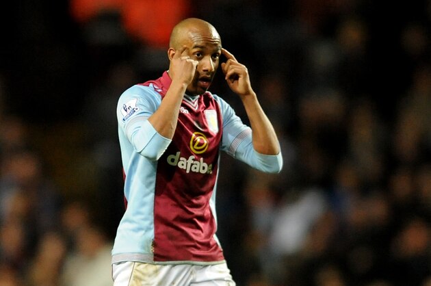 Aston Villa's Fabian Delph gestures after  scoring against Chelsea during the English Premier League soccer match between Aston Villa and Chelsea at Villa Park, Birmingham, England, Saturday, March 15, 2014.  (AP Photo/Rui Vieira)