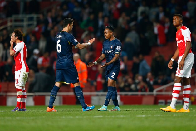 LONDON, ENGLAND - SEPTEMBER 23:  Nathaniel Clyne of Southampton is congratulated by Jose Fonte of Southampton at full time after their 2-1 win during the Capital One Cup Third Round match between Arsenal and Southampton at the Emirates Stadium on September 23, 2014 in London, England.  (Photo by Julian Finney/Getty Images)