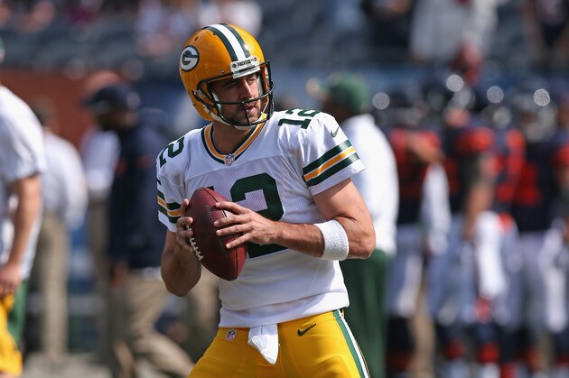 CHICAGO, IL - SEPTEMBER 28:  Aaron Rodgers #12 of the Green Bay Packers looks to pass during the first half of theirgame against the Chicago Bears at Soldier Field on September 28, 2014 in Chicago, Illinois.  (Photo by Jonathan Daniel/Getty Images)