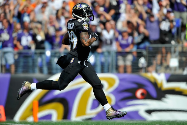 BALTIMORE, MD - SEPTEMBER 28:  Wide receiver Steve Smith #89 of the Baltimore Ravens scores a touchdown in the second quarter of a game against the Carolina Panthers at M&T Bank Stadium on September 28, 2014 in Baltimore, Maryland.  (Photo by Larry French/Getty Images)
