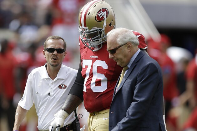 San Francisco 49ers offensive tackle Anthony Davis (76) walks off the field after being injured against the Philadelphia Eagles during the first half of an NFL football game in Santa Clara, Calif., Sunday, Sept. 28, 2014. (AP Photo/Ben Margot)