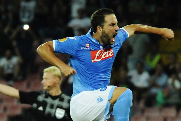 Napoli's Gonzalo Higuain celebrates after scoring during the Europa League Group I soccer match between Napoli and Sparta Prague, in Naples, Italy, Thursday Sept. 18, 2014. (AP Photo/Salvatore Laporta)