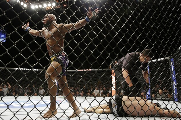 Yoel Romero celebrates after defeating Tim Kennedy in their middleweight mixed martial arts bout at UFC 178 on Saturday, Sept. 27, 2014, in Las Vegas. (AP Photo/John Locher)