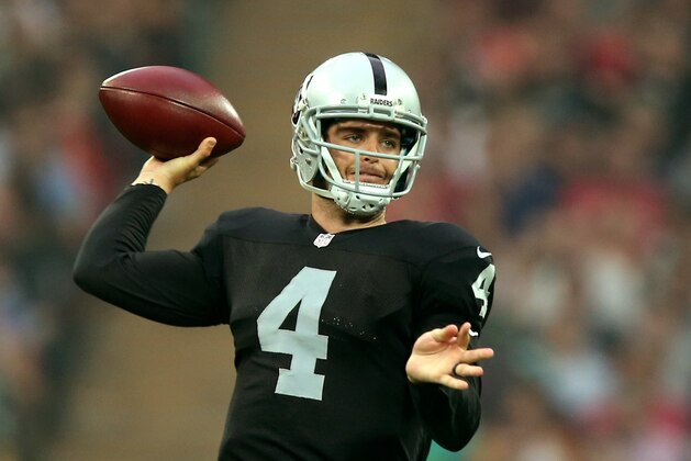 LONDON, ENGLAND - SEPTEMBER 28:  Derek Carr #4 of the Oakland Raiders passes during the NFL match between the Oakland Raiders and the Miami Dolphins at Wembley Stadium on September 28, 2014 in London, England.  (Photo by Ben Hoskins/Getty Images)
