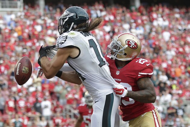 San Francisco 49ers defensive back Chris Culliver, right, breaks up a pass in the end zone intended for Philadelphia Eagles wide receiver Riley Cooper during the fourth quarter of an NFL football game in Santa Clara, Calif., Sunday, Sept. 28, 2014. The 49ers won 26-21. (AP Photo/Marcio Jose Sanchez)