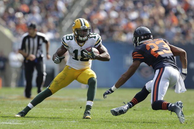Green Bay Packers wide receiver Randall Cobb (18) runs against Chicago Bears cornerback Kyle Fuller (23) in the second half of an NFL football game Sunday, Sept. 28, 2014, in Chicago. (AP Photo/Nam Y. Huh)