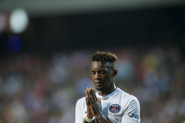 HONG KONG - JULY 29:  Jean-Christophe Bahebeck of Paris Saint-Germain reacts after missing an opportunity to score during the friendly match between Kitchee and Paris Saint-Germain at Hong Kong Stadium on July 29, 2014 in Hong Kong, Hong Kong.  (Photo by Victor Fraile/Getty Images)