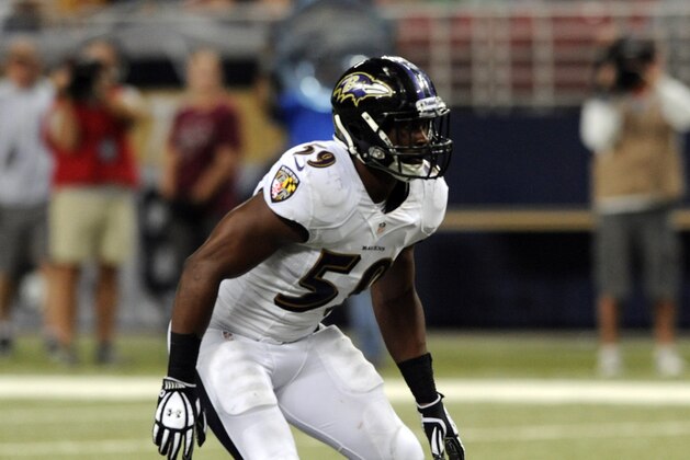Baltimore Ravens inside linebacker Arthur Brown takes up his position during the fourth quarter of an NFL preseason football game against the St. Louis Rams Thursday, Aug. 29, 2013, in St. Louis. (AP Photo/Bill Boyce)