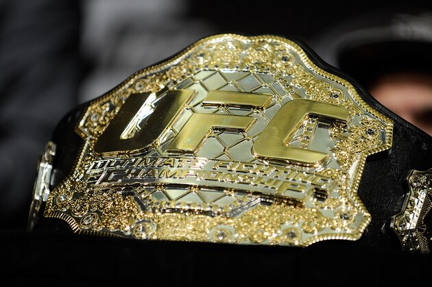 The UFC Championship belt is displayed during the news conference after the UFC 162 mixed martial arts bouts Saturday, July 6, 2013, in Las Vegas.  (AP Photo/David Becker)