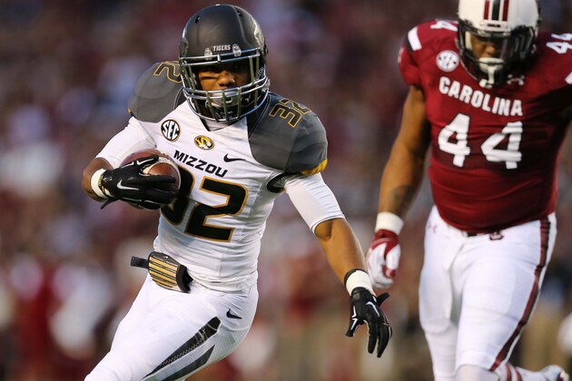 Sep 27, 2014; Columbia, SC, USA;  Missouri Tigers running back Russell Hansbrough (32) runs for a touchdown in the first quarter against the South Carolina Gamecocks at Williams-Brice Stadium. Mandatory Credit: Jim Dedmon-USA TODAY Sports