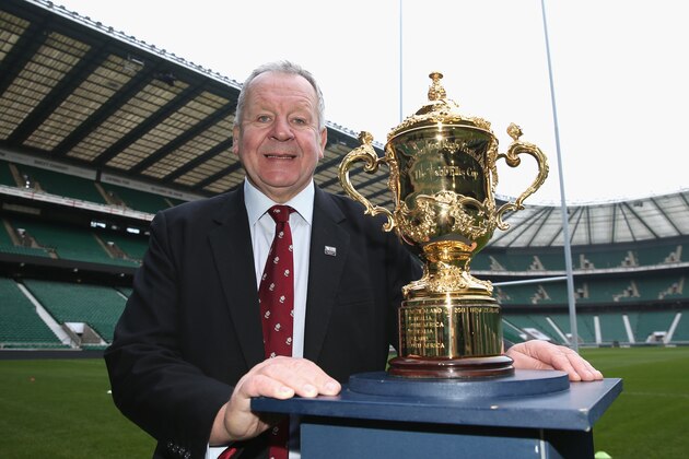 LONDON, ENGLAND - NOVEMBER 27:  Bill Beaumont, the RFU Chairman, poses with the Webb Ellis Cup during the England 2015 Rugby World Cup Ticketing and Times launch on November 27, 2013 in London, England.  (Photo by David Rogers/Getty Images)