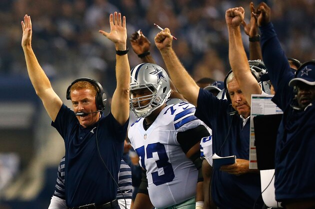 ARLINGTON, TX - SEPTEMBER 28:  Head coach Jason Garrett of the Dallas Cowboys reacts after the Cowboys score a touchdown against the New Orleans Saints in the first half at AT&T Stadium on September 28, 2014 in Arlington, Texas.  (Photo by Tom Pennington/Getty Images)