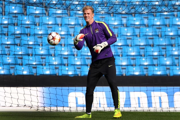 MANCHESTER, ENGLAND - SEPTEMBER 29:  Joe Hart of Manchester City warms up during a training session at the Etihad Stadium on September 29, 2014 in Manchester, England.  (Photo by Alex Livesey/Getty Images)