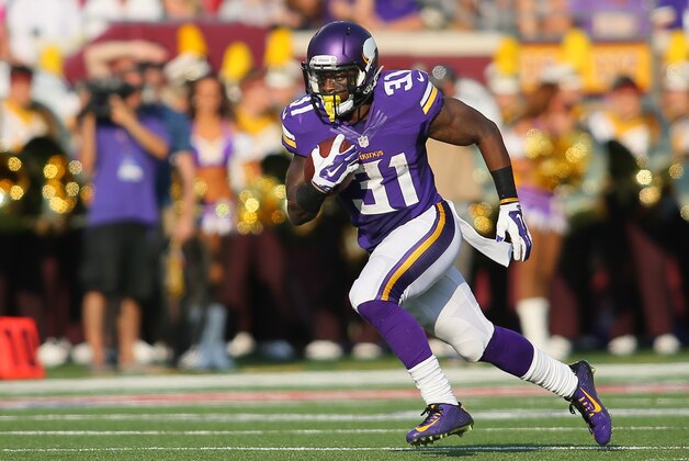 MINNEAPOLIS, MN - SEPTEMBER 28:  Jerick McKinnon #31 of the Minnesota Vikings advances the ball against the Atlanta Falcons on September 28, 2014 at TCF Bank Stadium in Minneapolis, Minnesota. (Photo by Adam Bettcher/Getty Images)