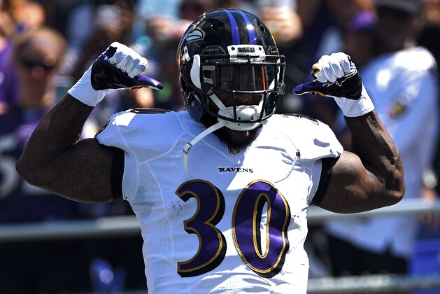 BALTIMORE, MD - SEPTEMBER 07: Running back Bernard Pierce #30 of the Baltimore Ravens is introduced before playing the Cincinnati Bengals at M&T Bank Stadium on September 7, 2014 in Baltimore, Maryland. The Cincinnati Bengals won, 23-16. (Photo by Patrick Smith/Getty Images)