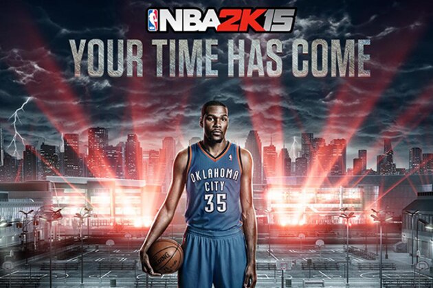 In this photo taken Tuesday, Sept. 16, 2014, 2K Sports Vice President Sports Development, Jeffrey Thomas, poses for a photo with his company's NBA 2K15 video game technology featuring NBA Oklahoma City Thunder Kevin Durant, during a demonstration at the Associated Press's office in Los Angeles. The NBA 2k15 upcoming basketball simulation video game developed by Visual Concepts and published by 2K Sports  releases Oct. 7, 2014. (AP Photo/Damian Dovarganes)
