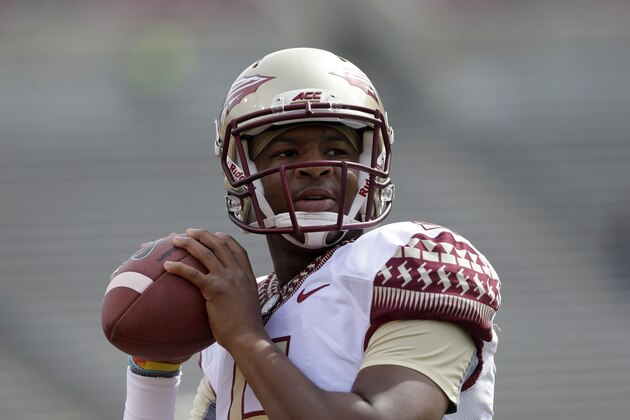 Florida State's quarterback Jameis Winston warms up prior to an NCAA college football game against North Carolina State in Raleigh, N.C., Saturday, Sept. 27, 2014. (AP Photo/Gerry Broome)