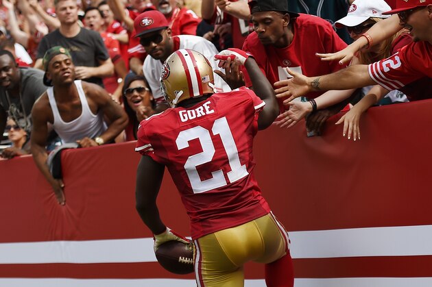 SANTA CLARA, CA - SEPTEMBER 28:  Frank Gore #21 of the San Francisco 49ers celebrates with fans after scoring a touchdown against the Philadelphia Eagles during the second quarter at Levi's Stadium on September 28, 2014 in Santa Clara, California. The 49ers won the game 26-21. (Photo by Thearon W. Henderson/Getty Images)